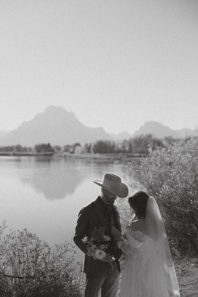 Bride and Groom share their vows in front of the Snake River