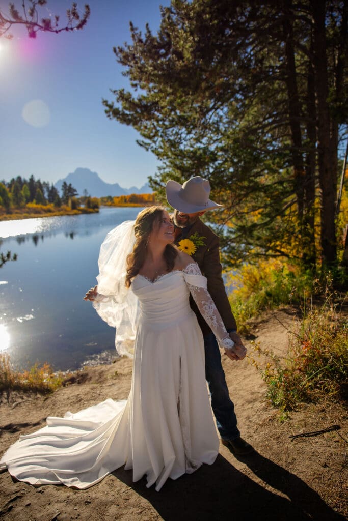 Bride and groom excitedly look at each other