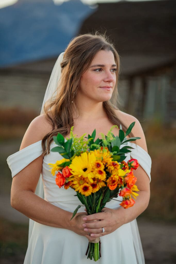 Bride shows off bouquet her husband made her