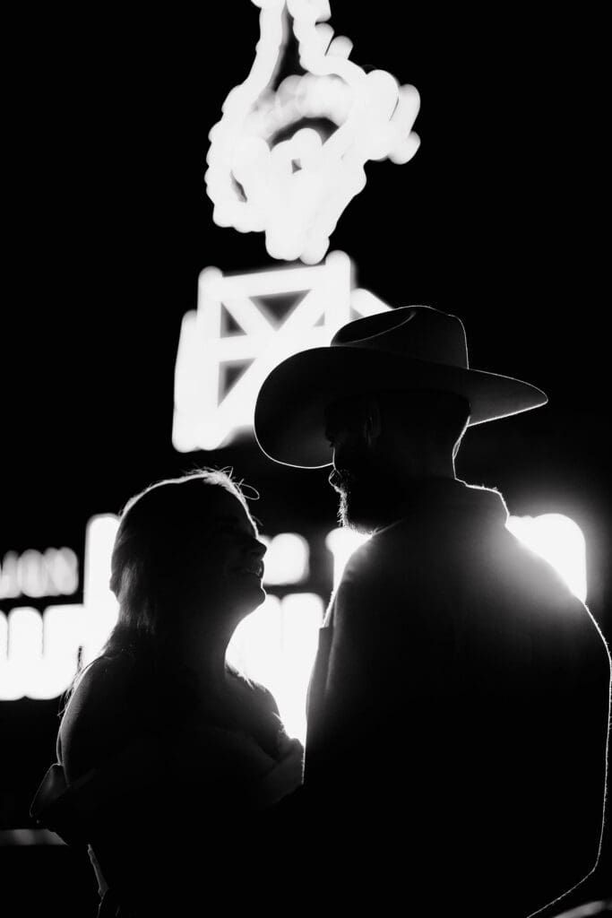 The city lights light up bride and groom