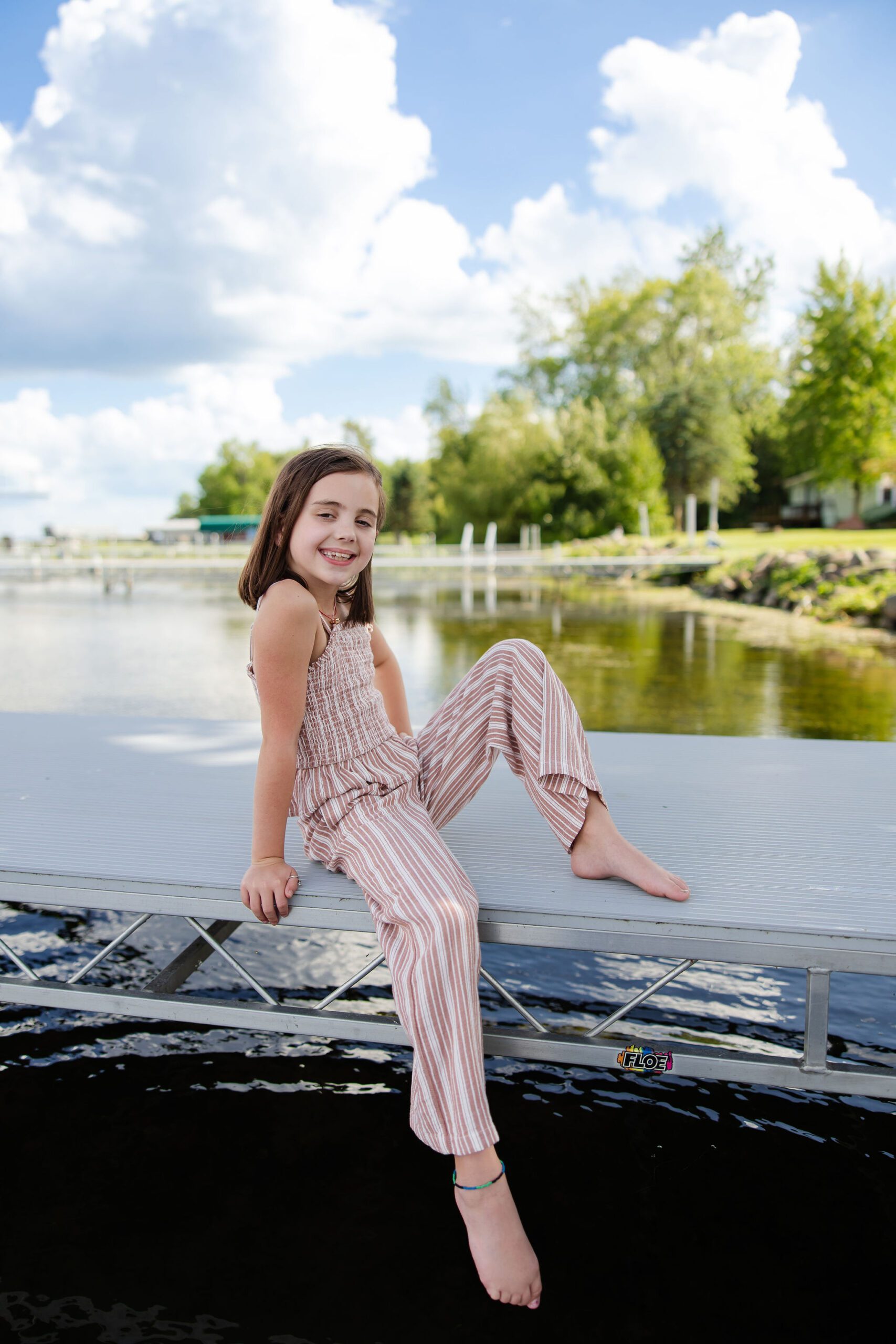 Girl poses on dock for Minnesota lakeside photos