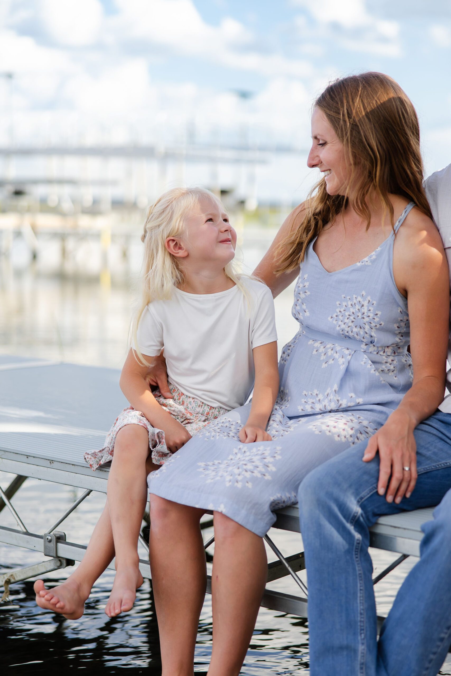 little girl admires her mother