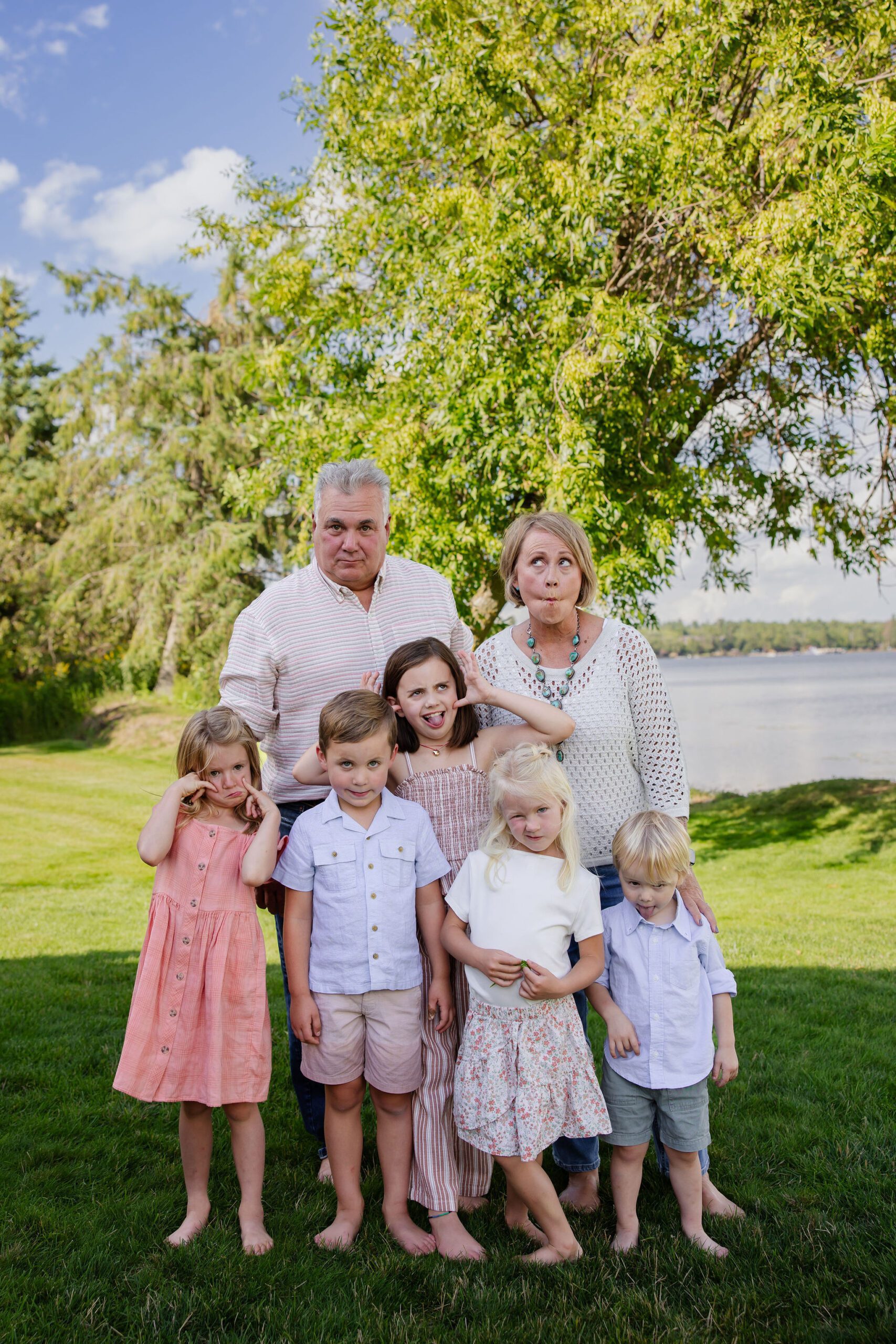Grandparents make silly face with grandkids