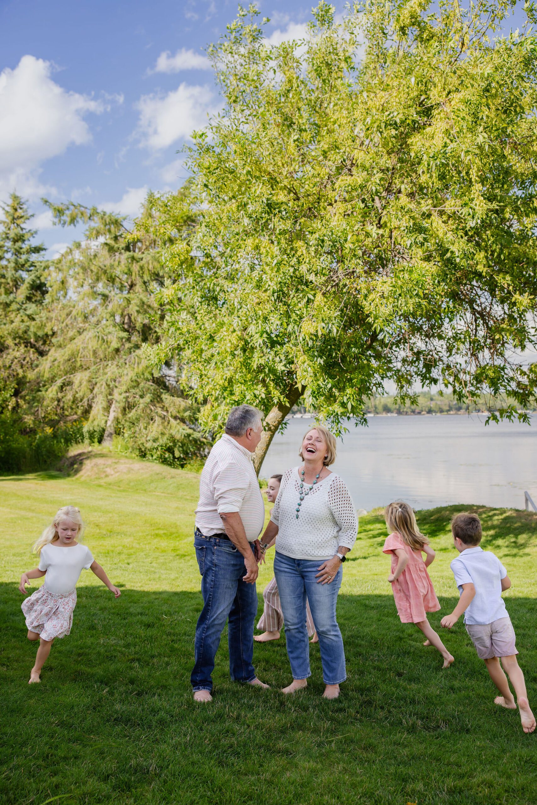 Grandparents laugh at silly grandkids