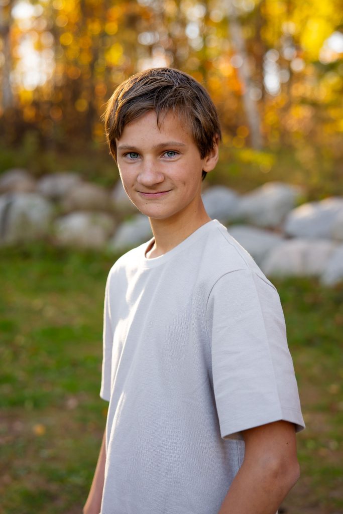 boy smiles at camera