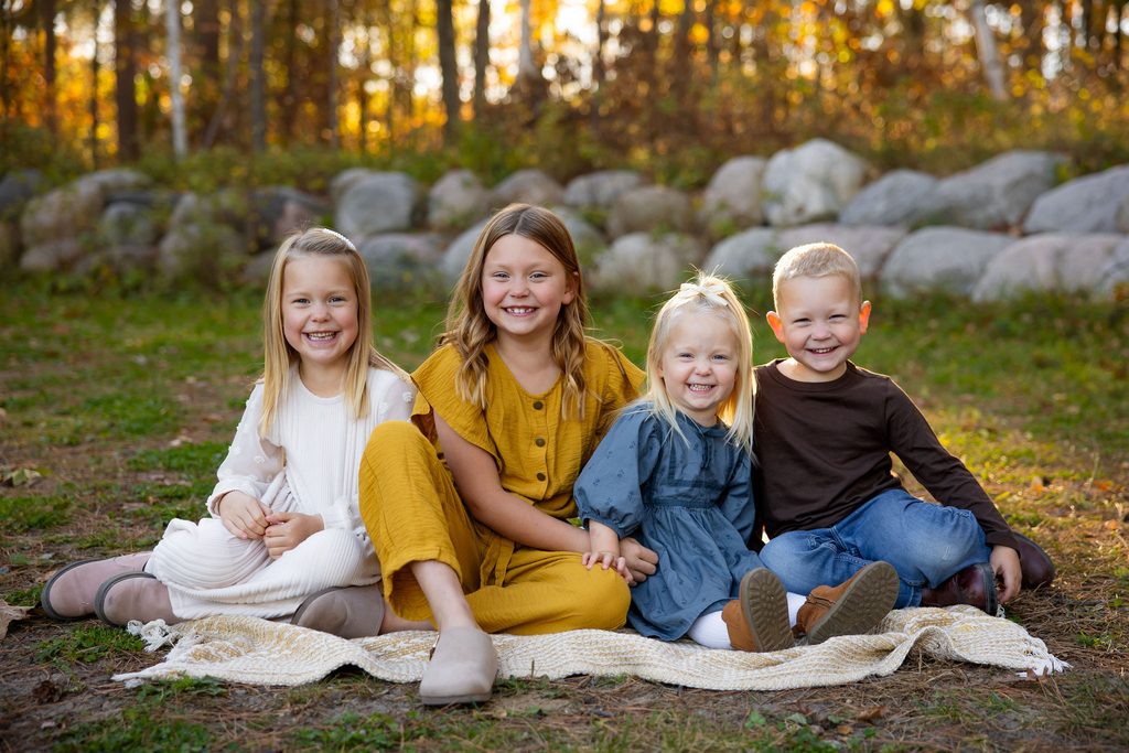 Siblings smile for photo together
