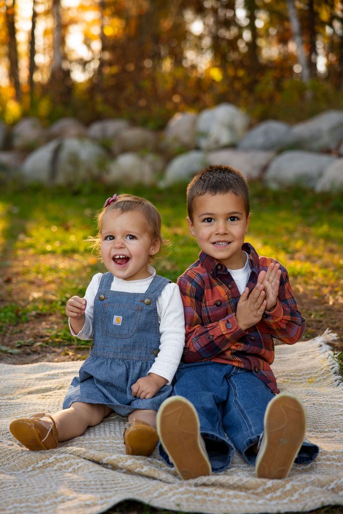 siblings share big smiles for photos