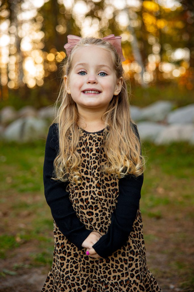 Little girl shows her smile 