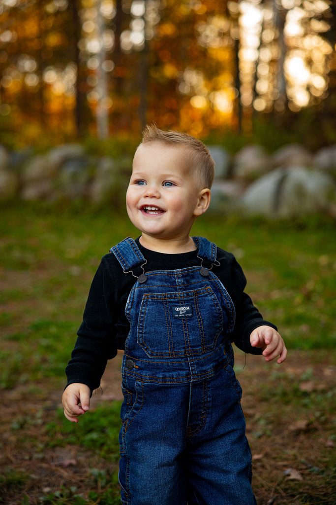 Little boy looks at mom and dad
