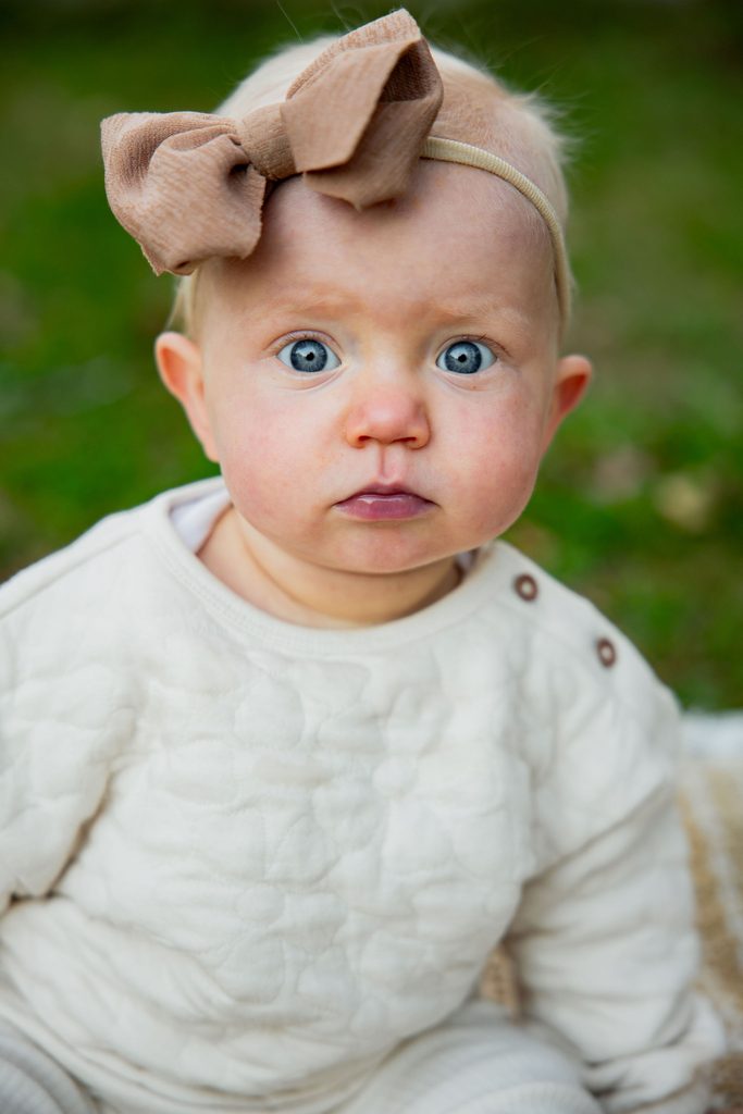 Baby looks at camera