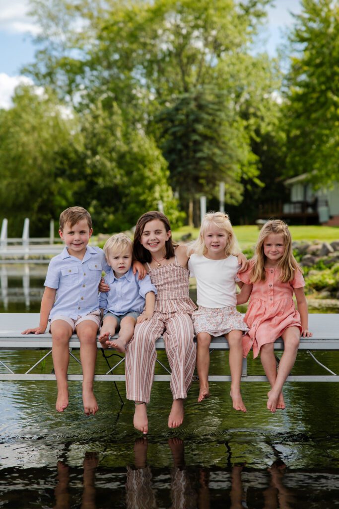 Grandkids pose for a photo on Lake Bemidji