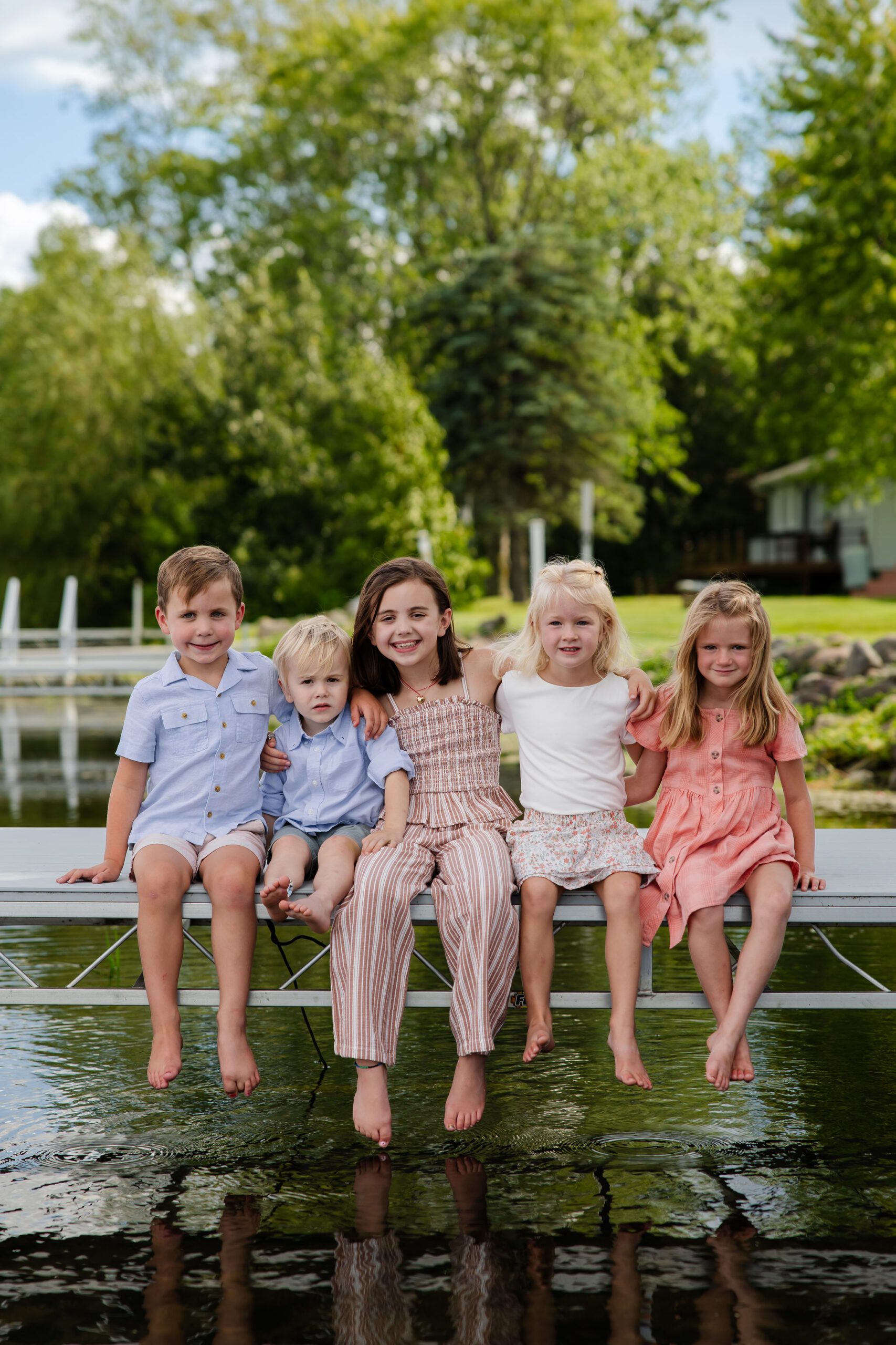 Grandkids pose for lakeside photos